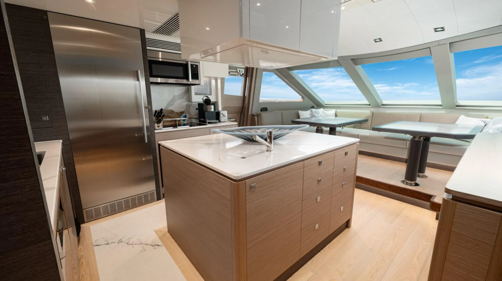 a kitchen with a large window aboard 90 HORIZON Yacht for Sale
