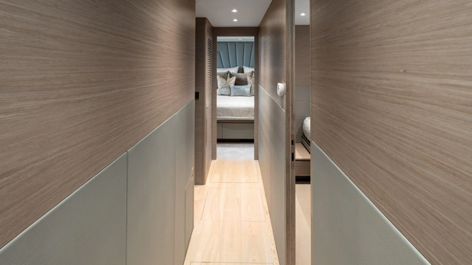 a room with a wood floor and a bed aboard 90 HORIZON Yacht for Sale