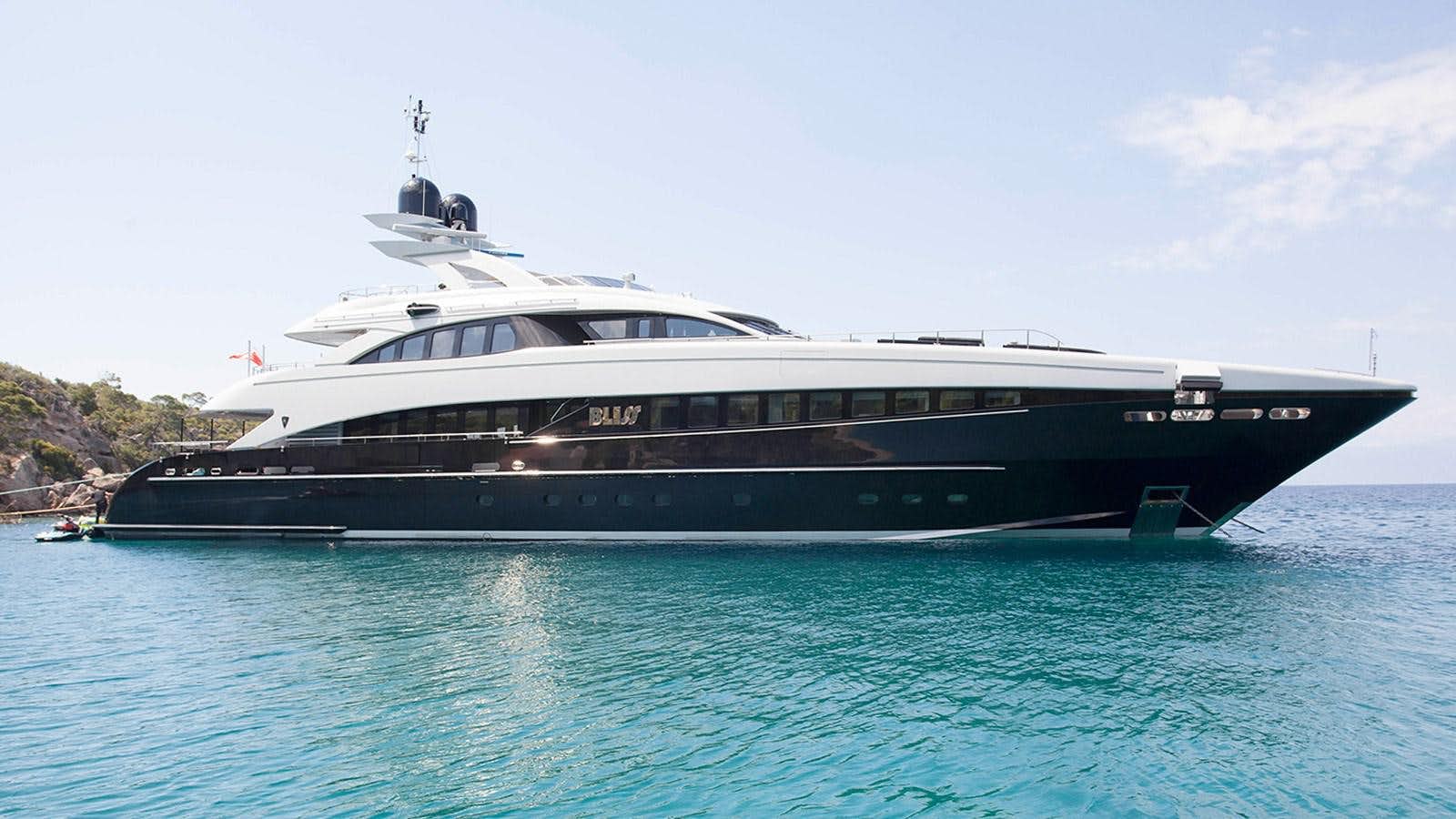 a large boat in the water aboard BLISS Yacht for Sale