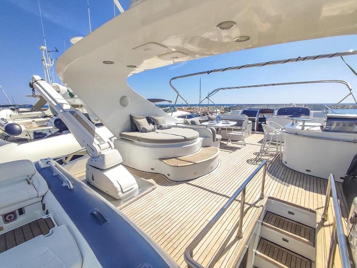 a boat docked at a pier aboard SEVEN YOU Yacht for Sale