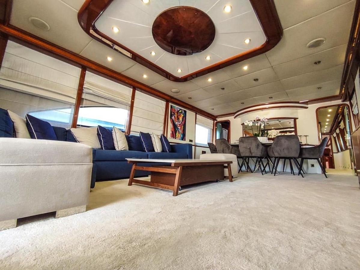 a large living room with a large ceiling aboard SEVEN YOU Yacht for Sale