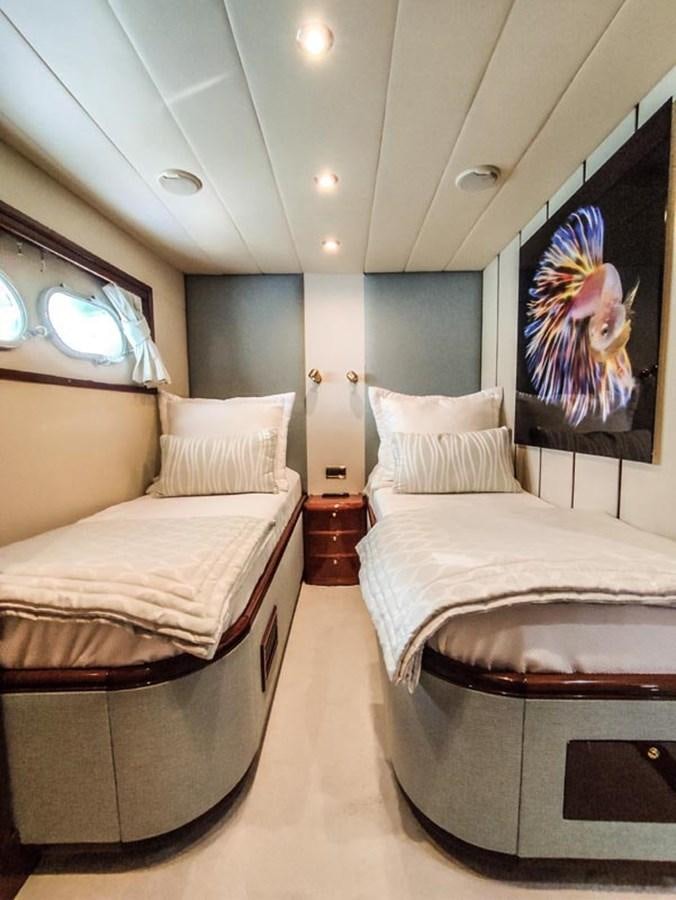 a room with two beds aboard SEVEN YOU Yacht for Sale