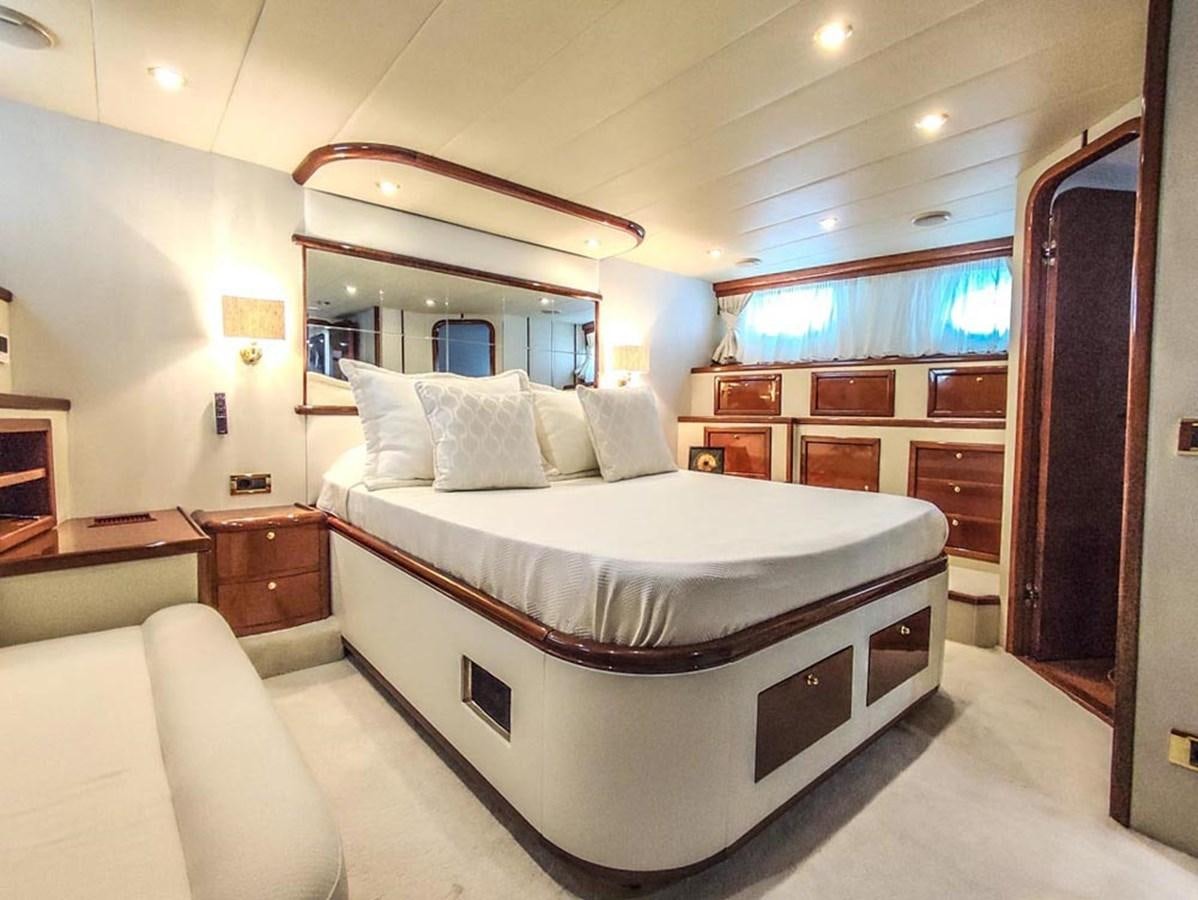 a large bed in a room aboard SEVEN YOU Yacht for Sale