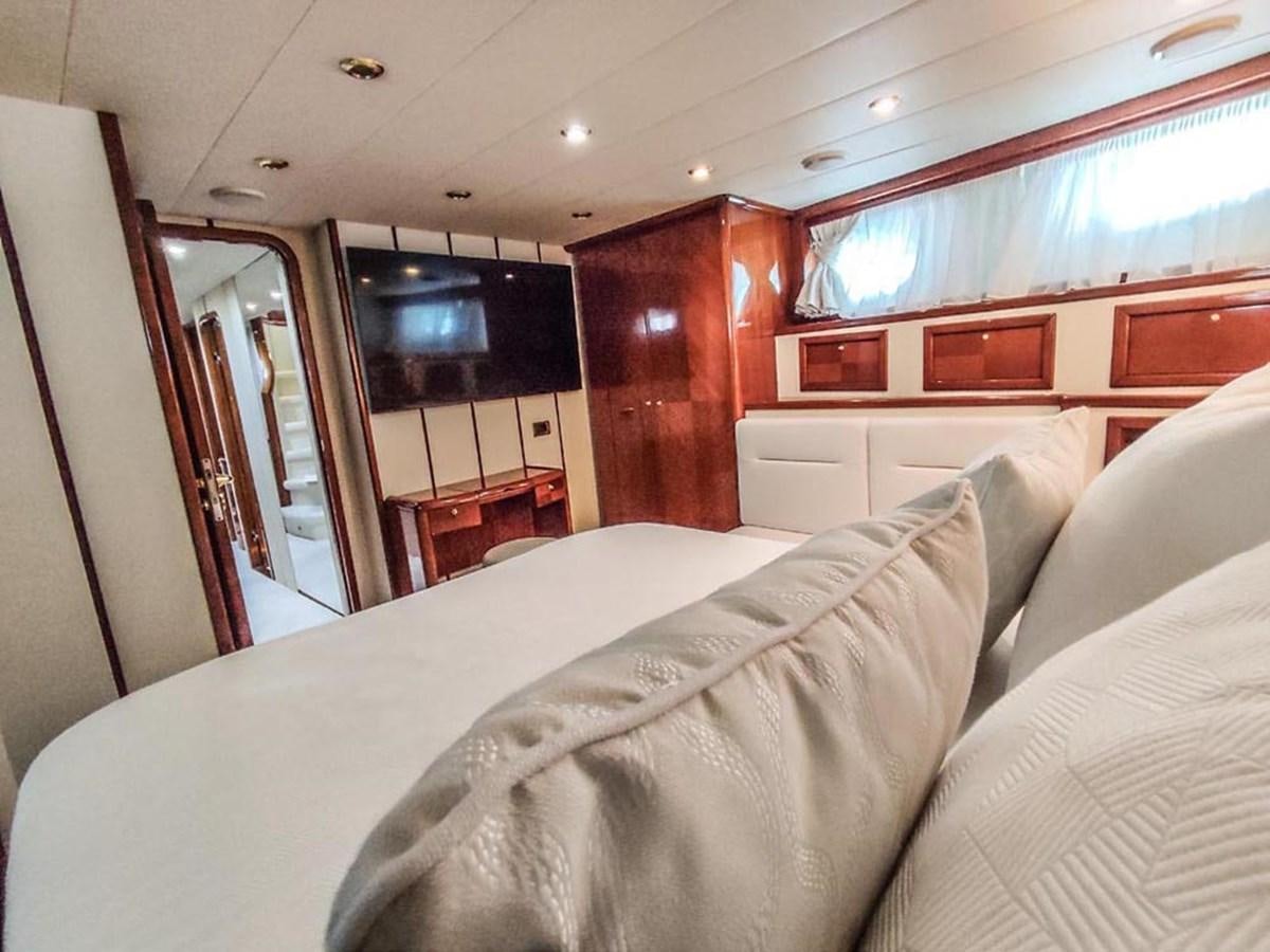 a bed in a room aboard SEVEN YOU Yacht for Sale