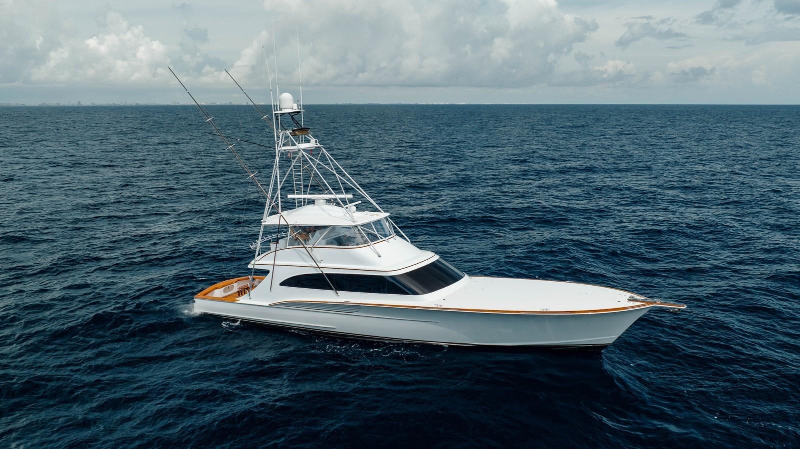 a white boat in the water aboard JARUCO Yacht for Sale