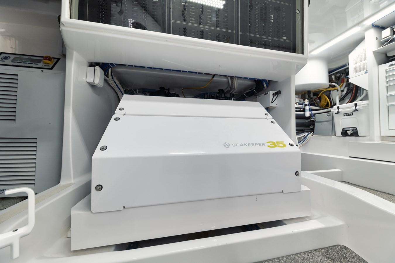 a machine with a large piece of paper on the top aboard JARUCO Yacht for Sale