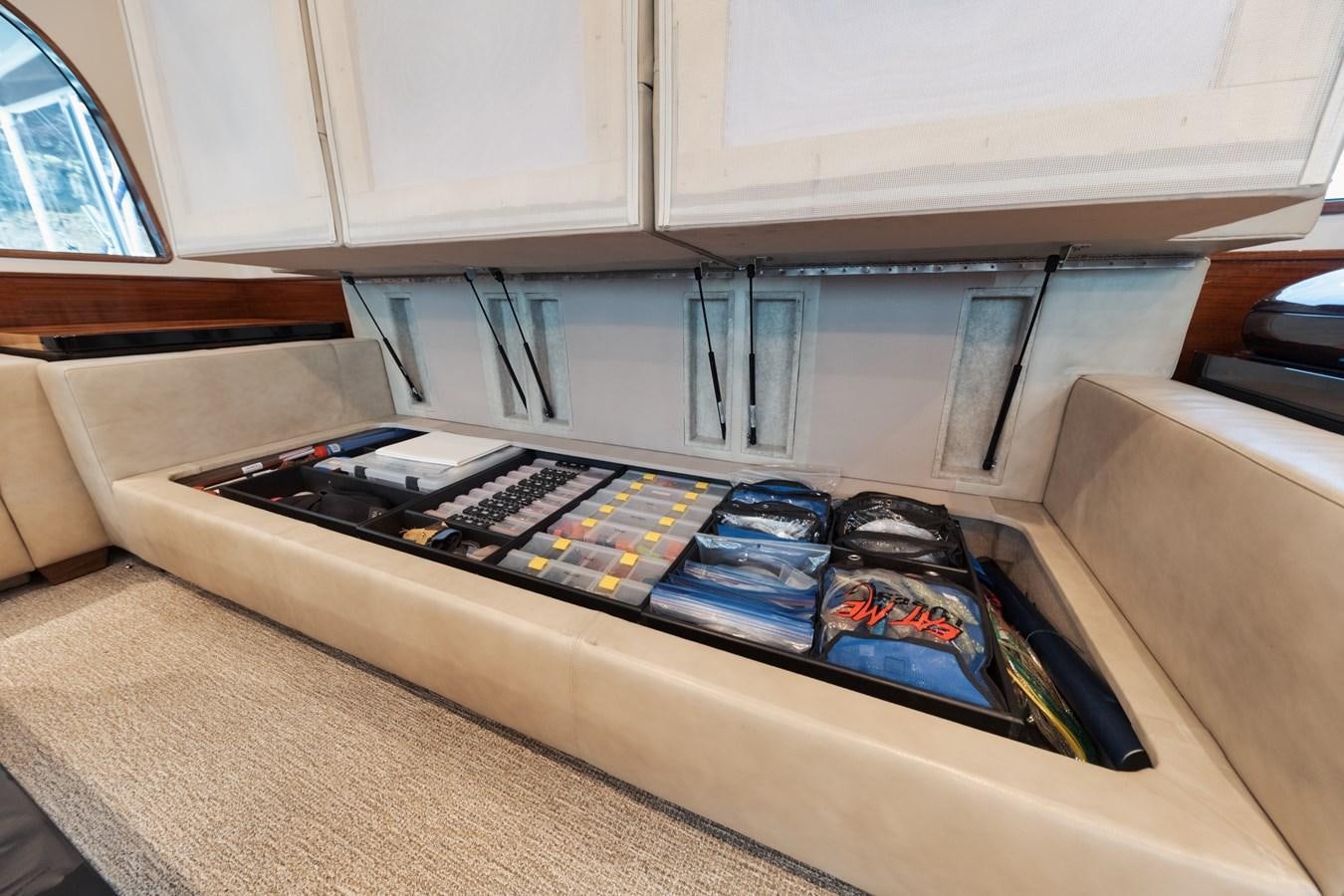 a kitchen counter with a sink and a dishwasher aboard JARUCO Yacht for Sale