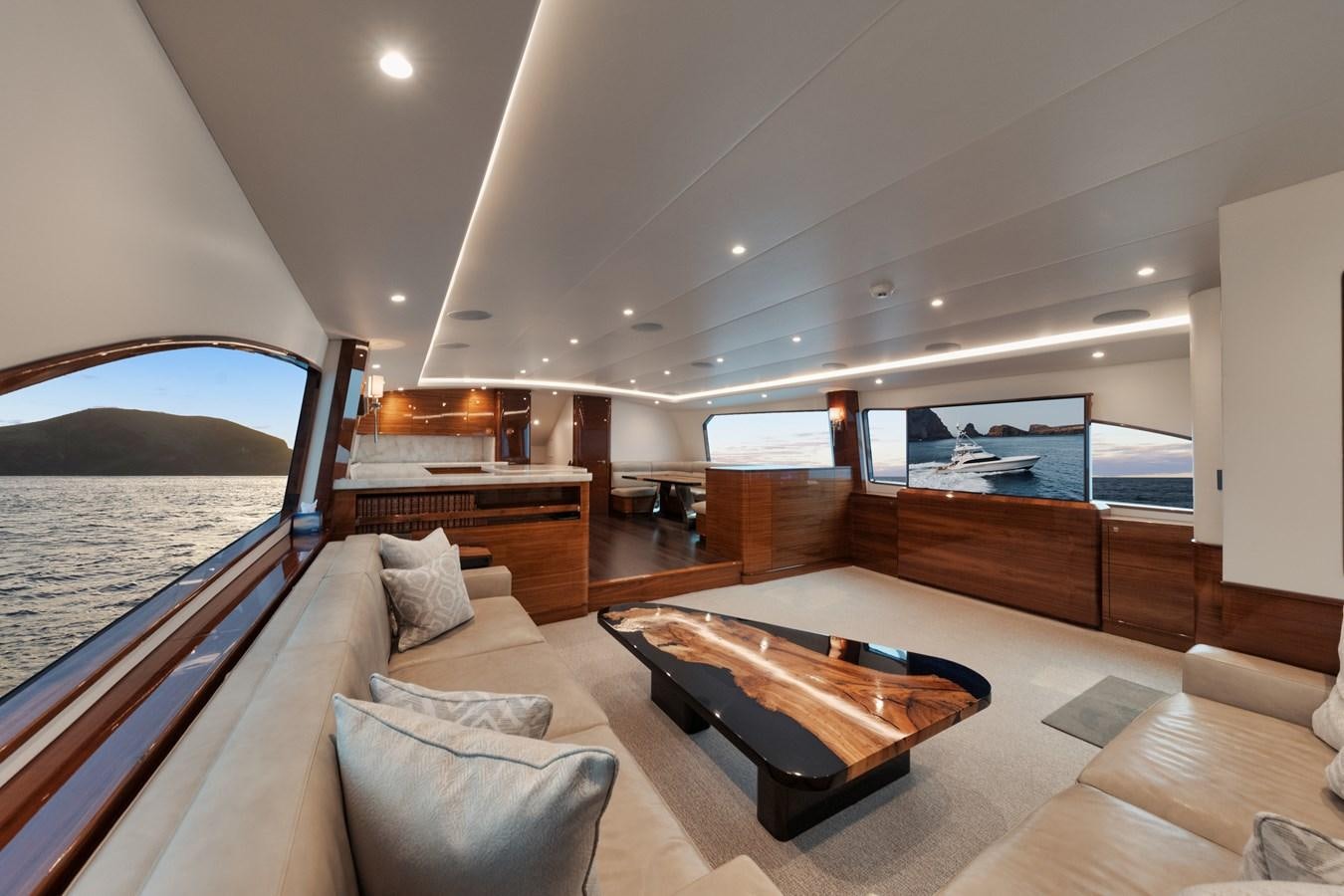 a large bedroom with a bed and a large window aboard JARUCO Yacht for Sale