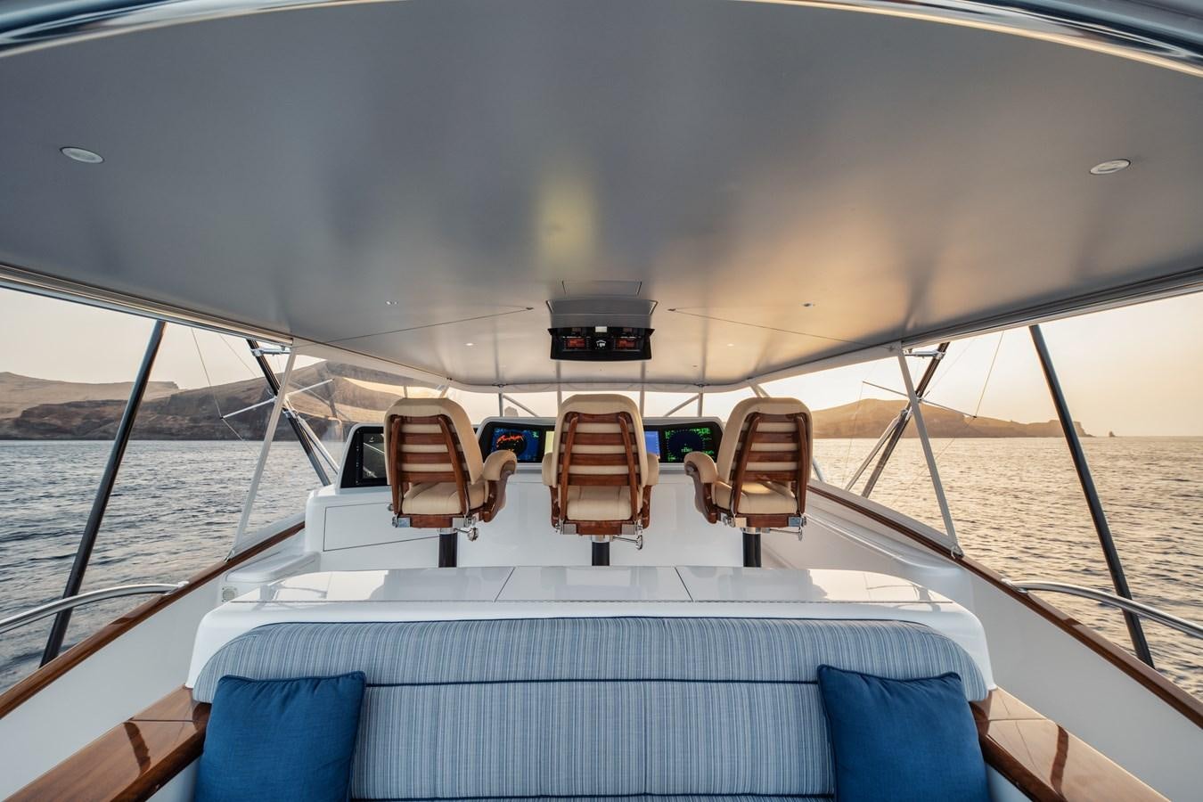 a boat with chairs on the deck aboard JARUCO Yacht for Sale