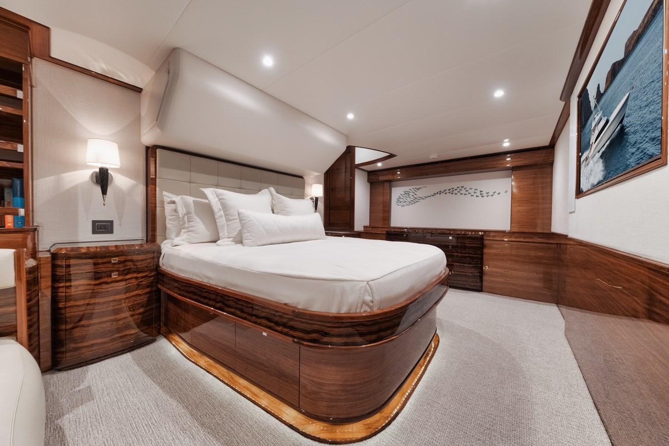 a large bedroom with a large bed aboard JARUCO Yacht for Sale