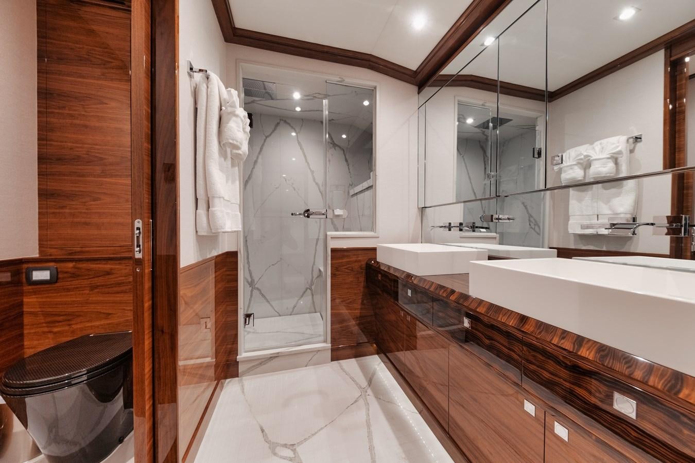 a bathroom with a large shower aboard JARUCO Yacht for Sale