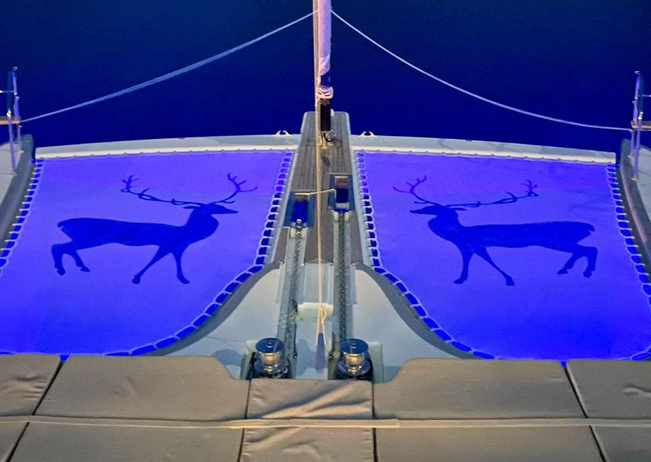 a large mural on a wall aboard BLUE DEER Yacht for Sale