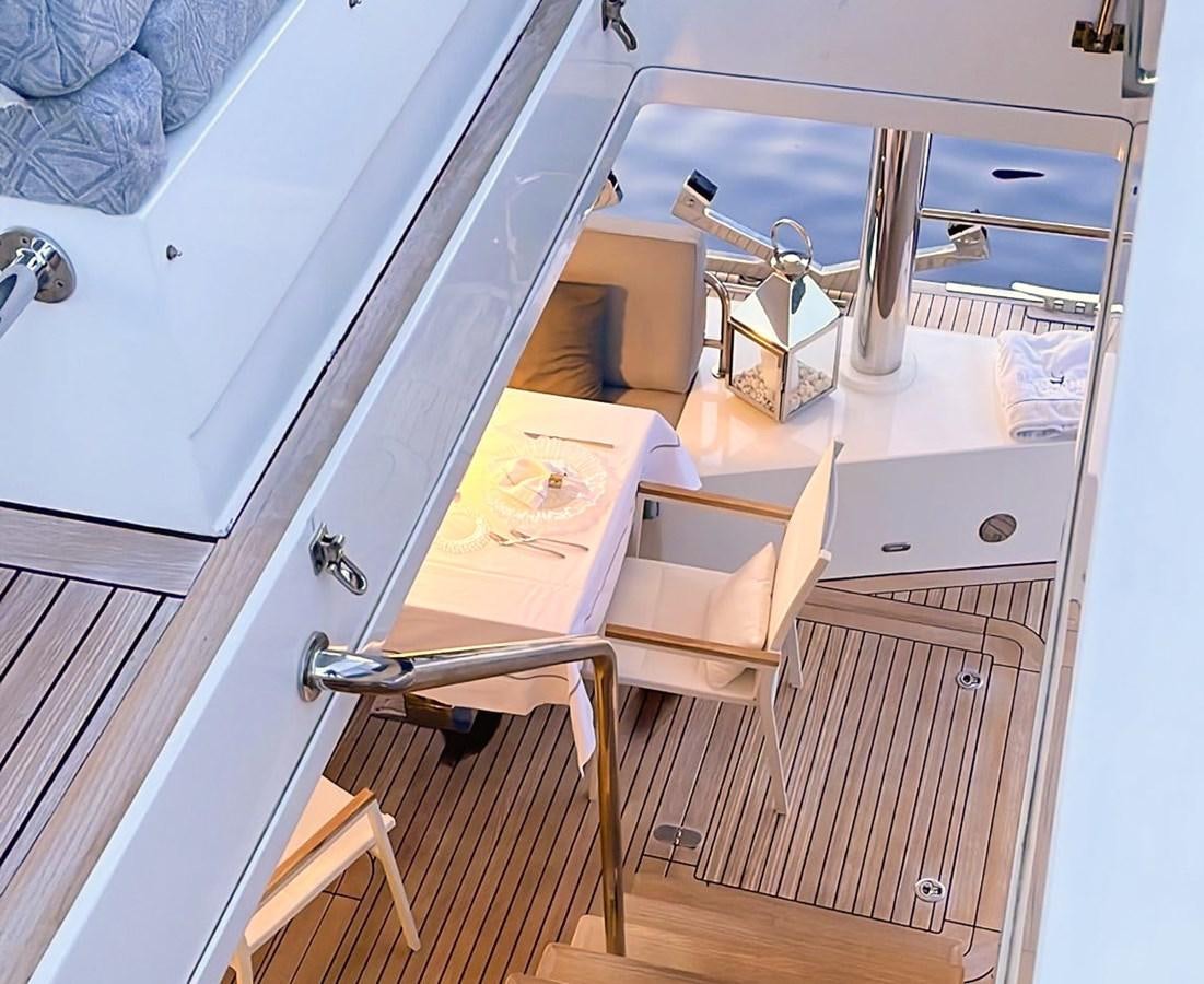 a white sink with a faucet aboard BLUE DEER Yacht for Sale