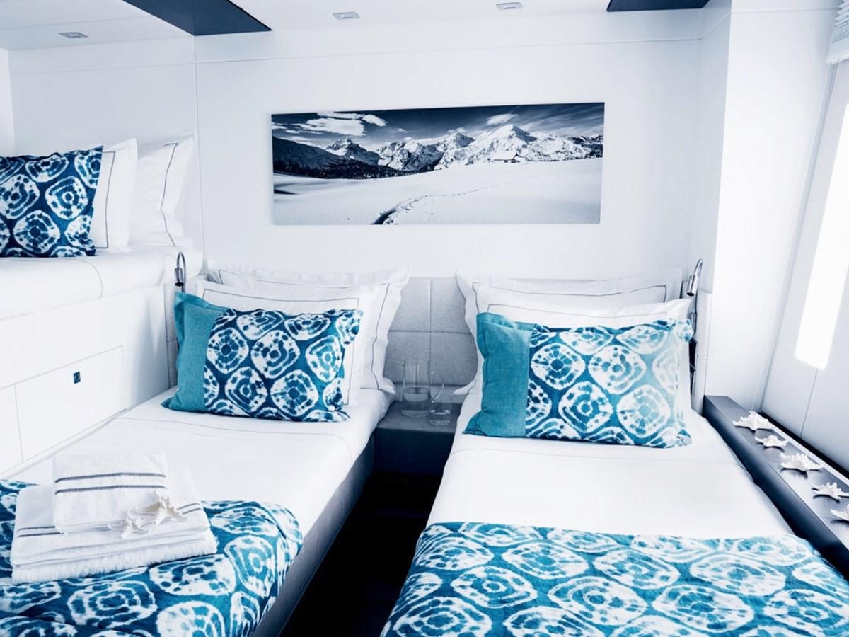 a couple of beds in a room aboard BLUE DEER Yacht for Sale