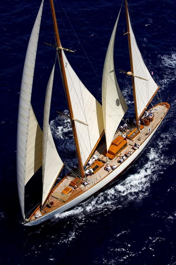 a sailboat in the water aboard SUMURUN Yacht for Sale