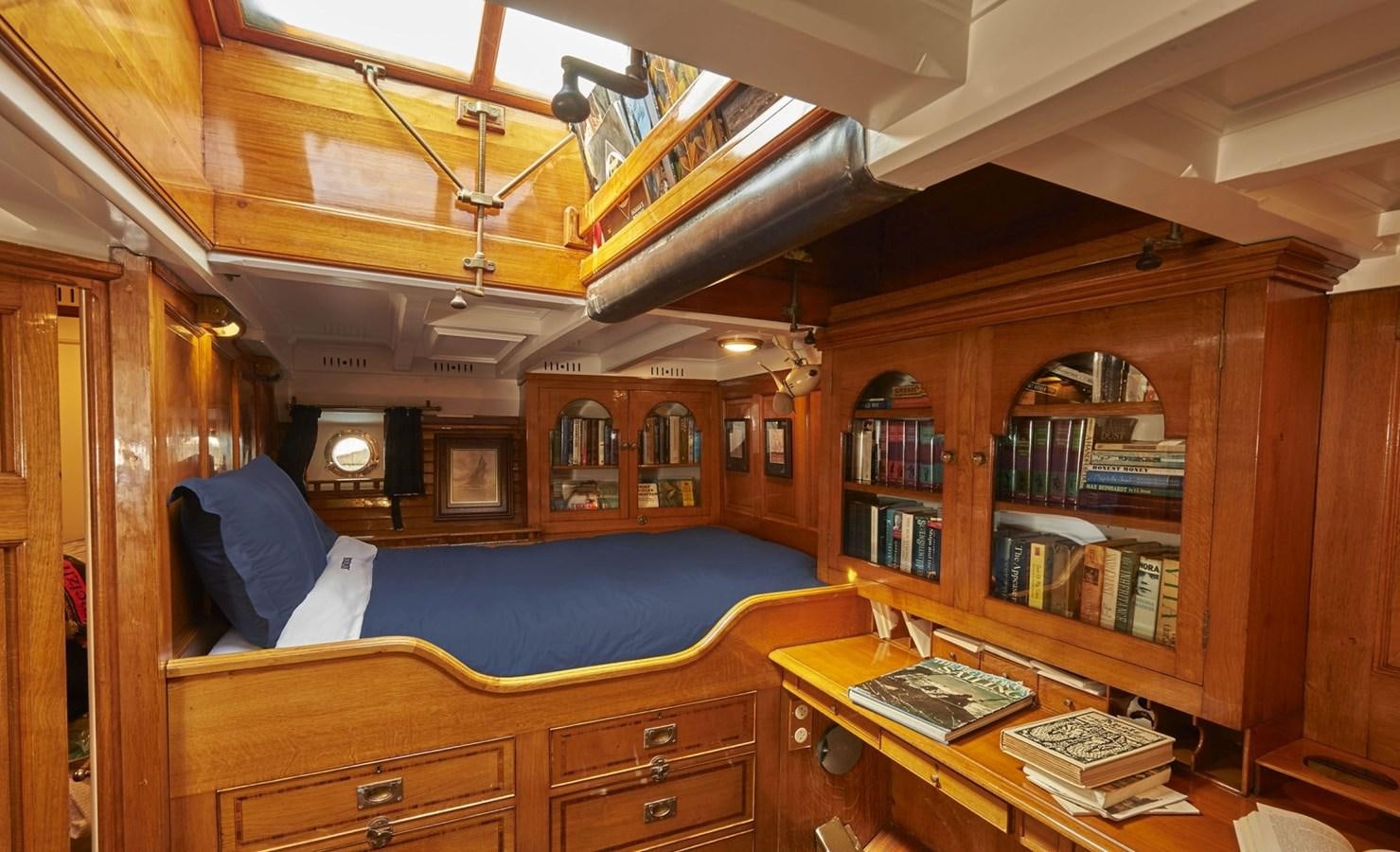 a bed in a room aboard SUMURUN Yacht for Sale