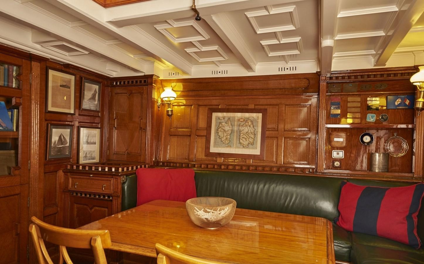 a room with a couch and a table aboard SUMURUN Yacht for Sale