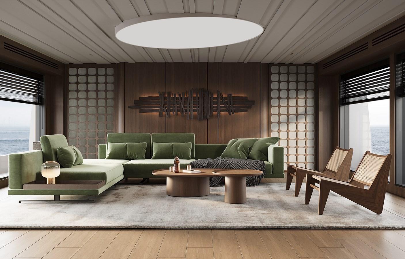 a living room with green couches aboard DYNAMIQ GLOBAL 550 Yacht for Sale