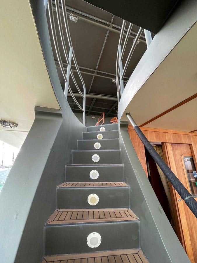 a black rectangular object with a metal frame and a metal rod on the side aboard SAN GENNARO Yacht for Sale