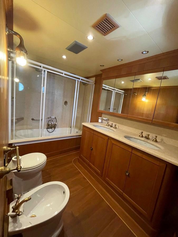 a bathroom with a large mirror aboard SAN GENNARO Yacht for Sale