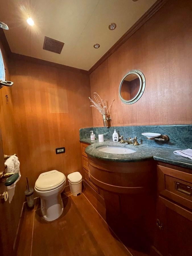 a bathroom with a sink and a toilet aboard SAN GENNARO Yacht for Sale