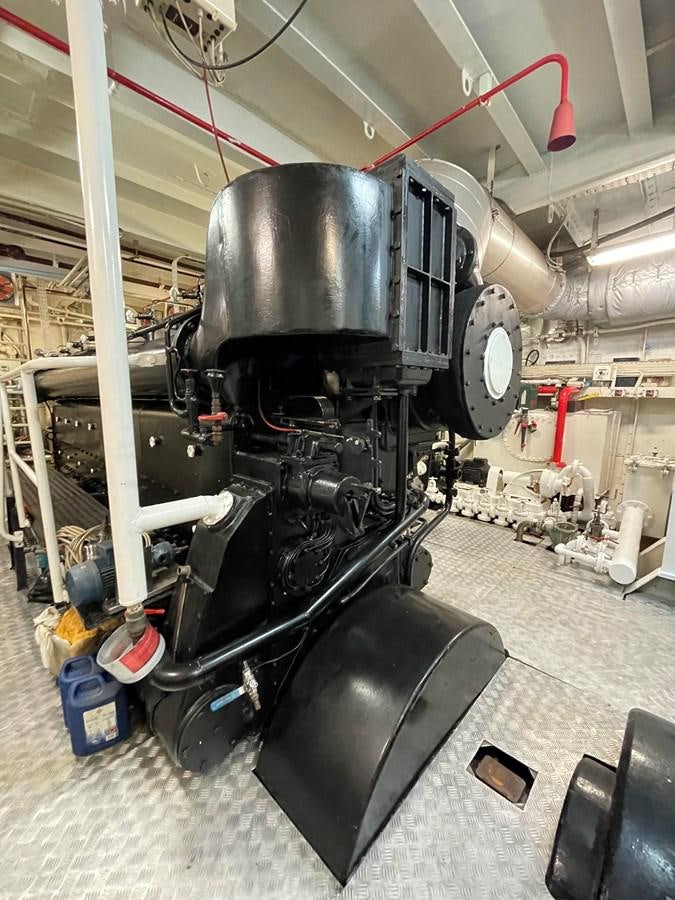 a large black machine in a factory aboard SAN GENNARO Yacht for Sale
