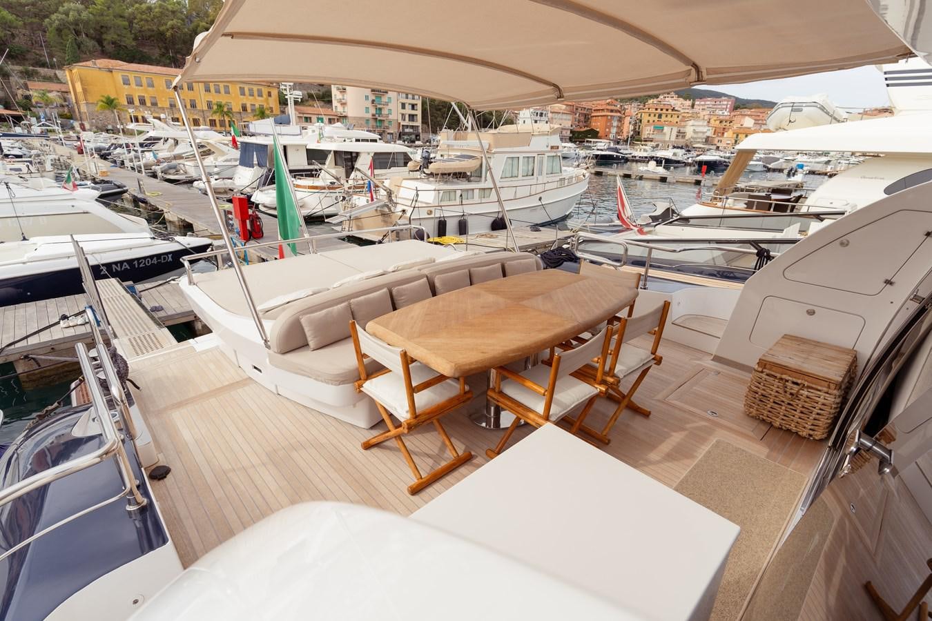 a table and chairs on a boat aboard CINQUE LUNE Yacht for Sale