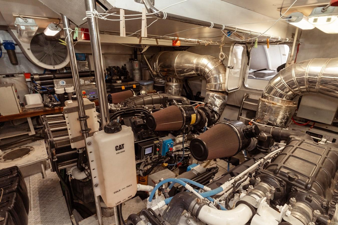 a machine with a large metal cylinder aboard CINQUE LUNE Yacht for Sale