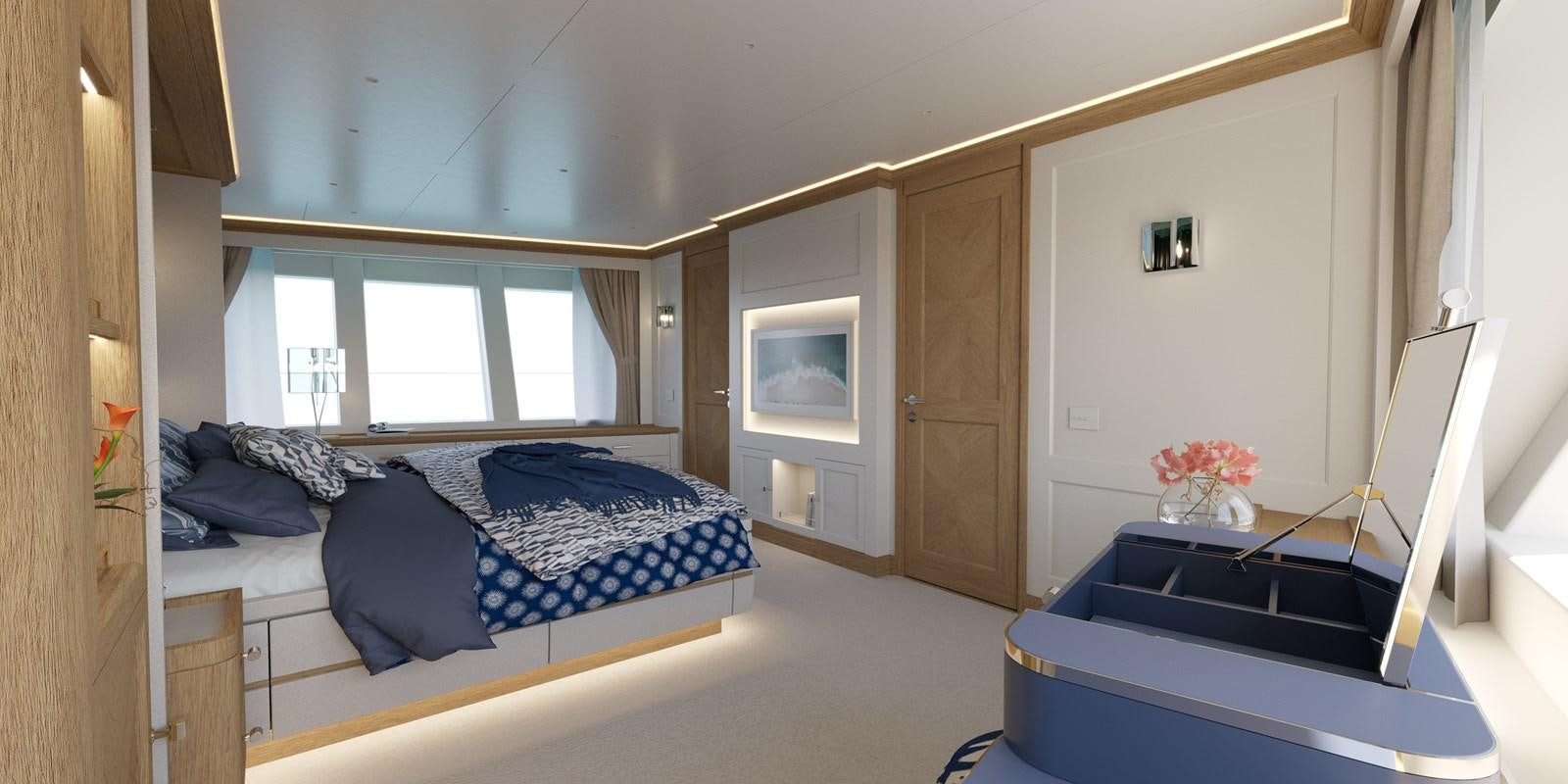 a bedroom with a bed and a desk aboard RMK 120 # 02 Yacht for Sale