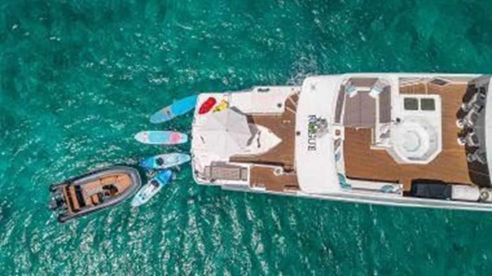 a group of objects on a green surface aboard ROGUE Yacht for Sale