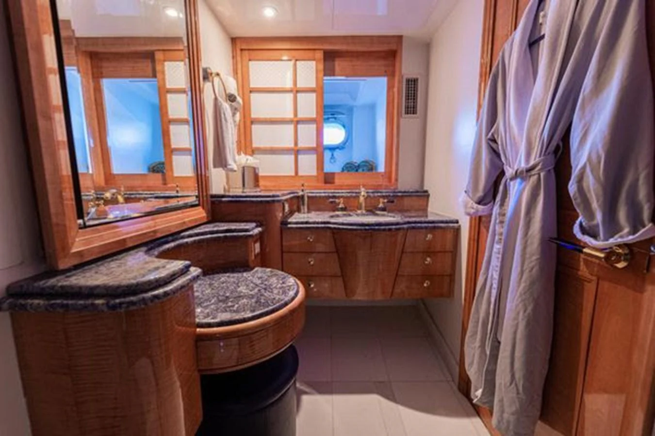a bathroom with a sink and a mirror aboard ROGUE Yacht for Sale