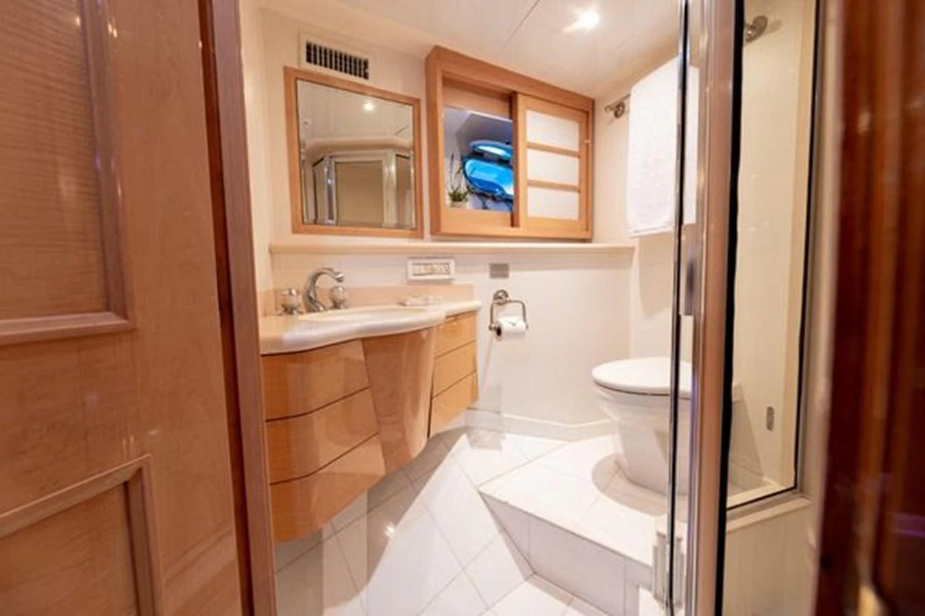 a bathroom with a toilet and a sink aboard ROGUE Yacht for Sale