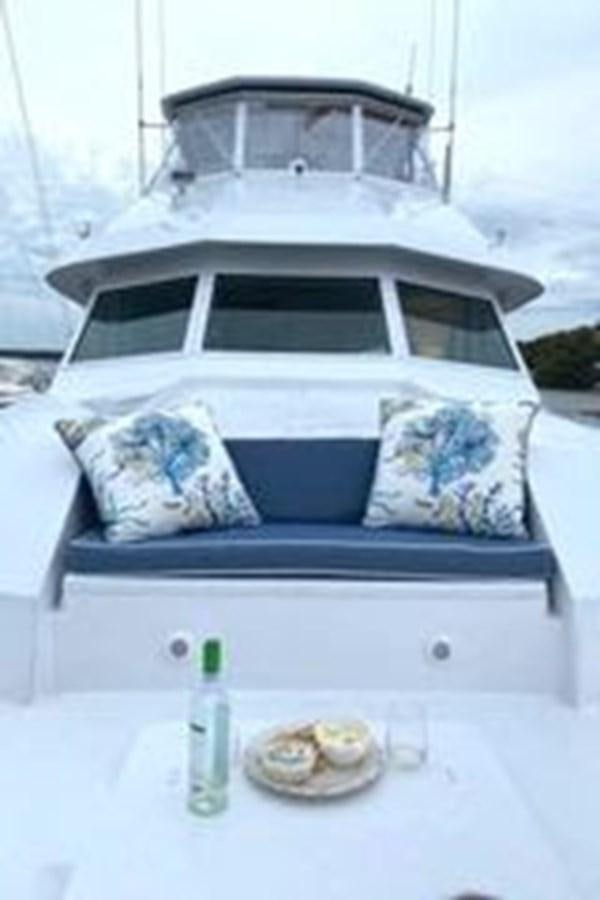a white car with a white roof aboard NORTHER VENTURE Yacht for Sale
