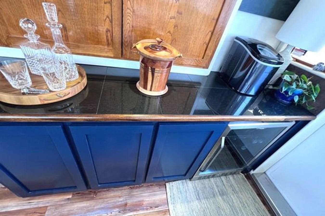 a kitchen with a pot on the stove aboard NORTHER VENTURE Yacht for Sale