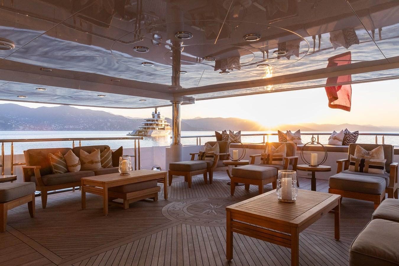 a room with a table and chairs aboard SKYFALL Yacht for Sale