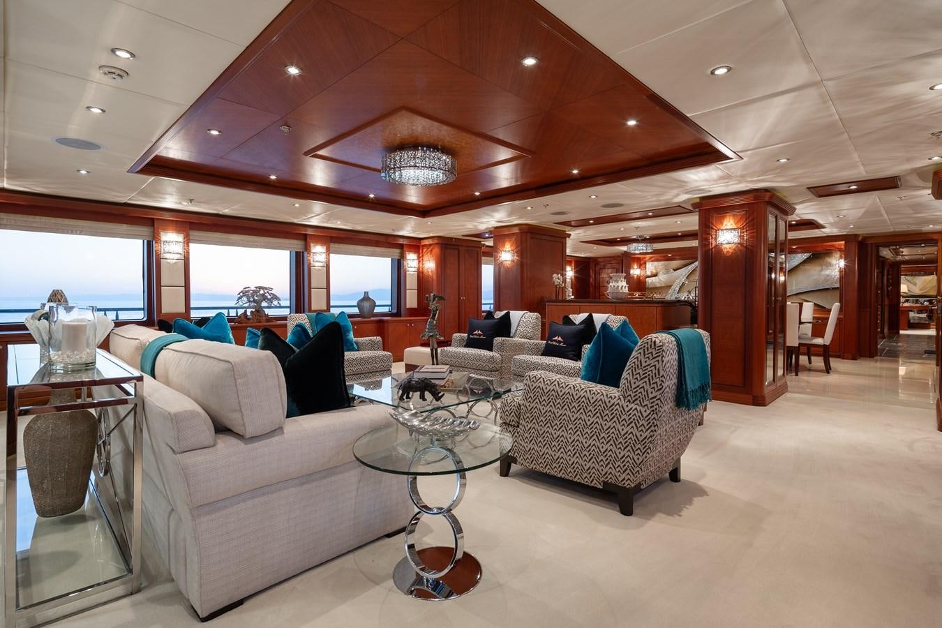 a living room with a large window aboard SKYFALL Yacht for Sale