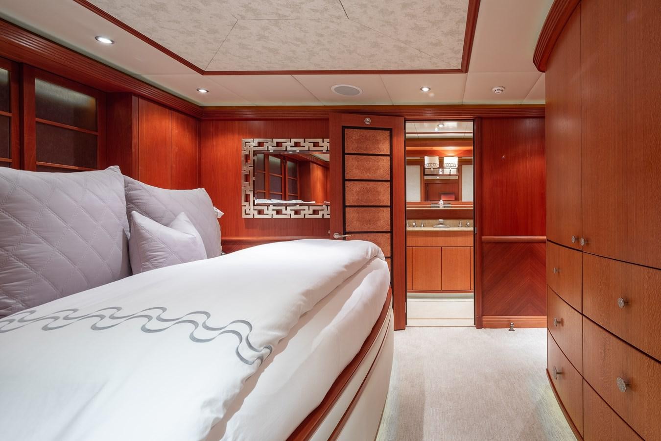a bed in a room aboard SKYFALL Yacht for Sale