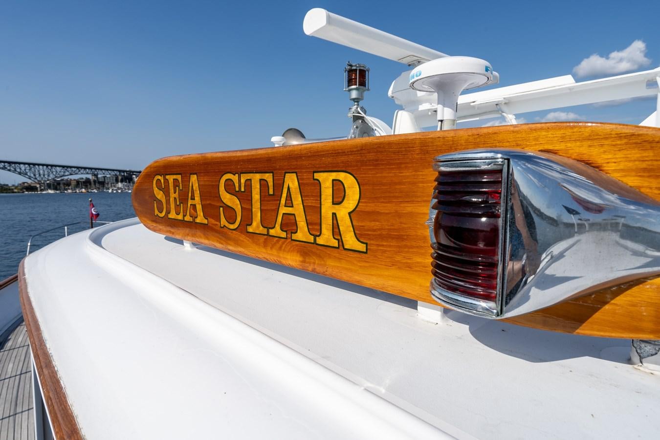 a boat with a sign on the front aboard SEA STAR Yacht for Sale