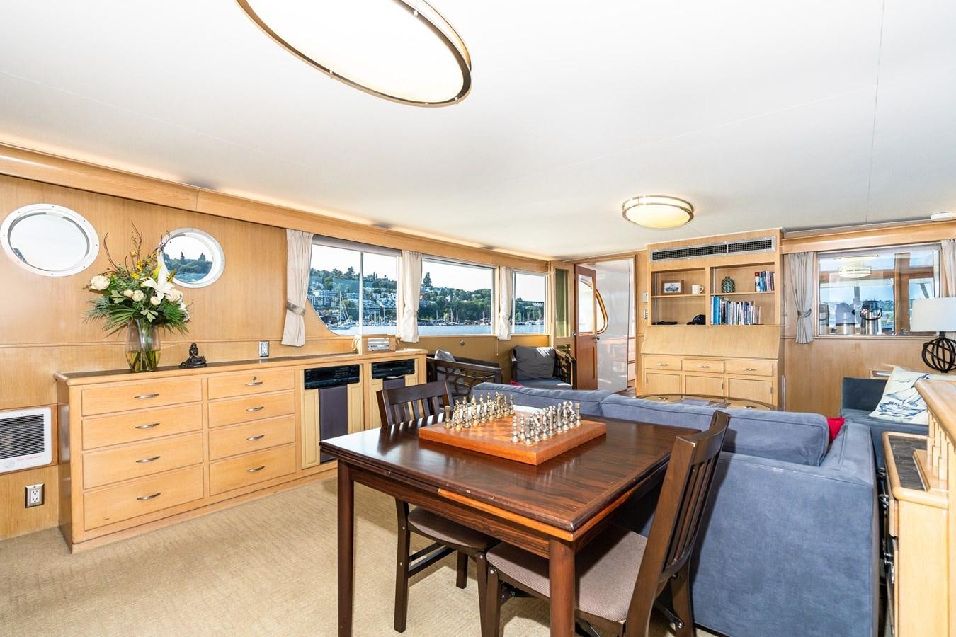 a kitchen with a dining table aboard SEA STAR Yacht for Sale
