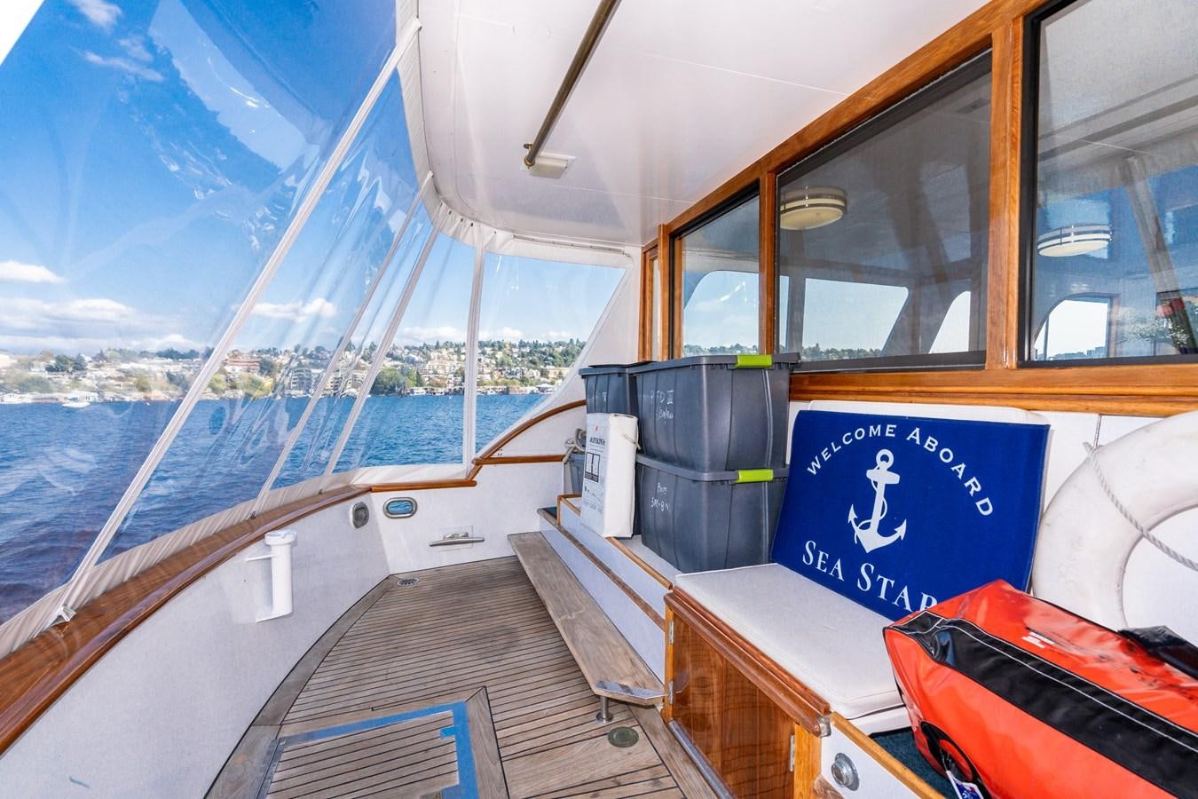 a boat with a sign on the front aboard SEA STAR Yacht for Sale