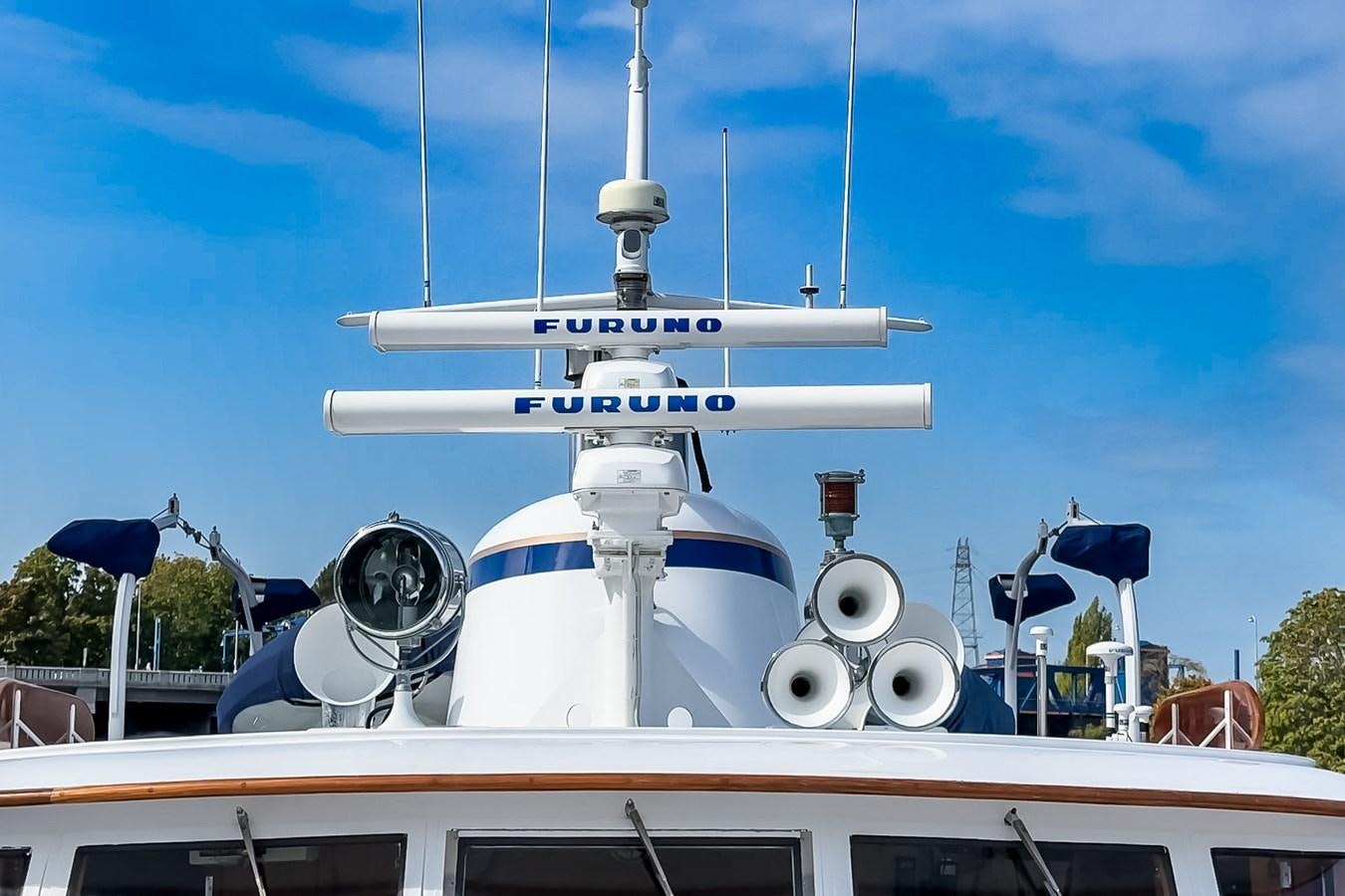 a white and blue boat on a building aboard SEA STAR Yacht for Sale