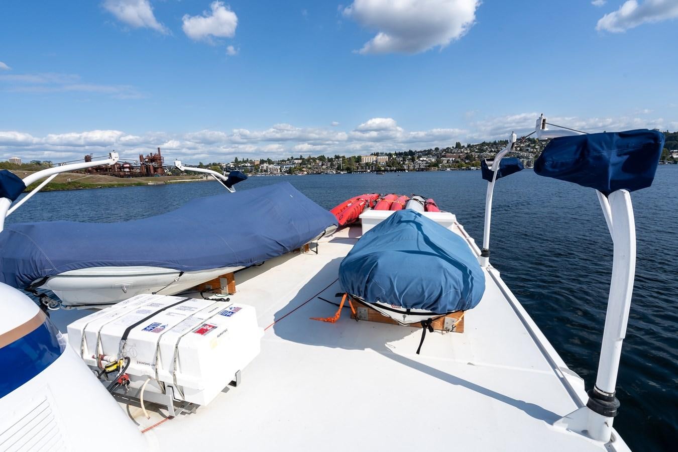 a group of boats on a beach aboard SEA STAR Yacht for Sale