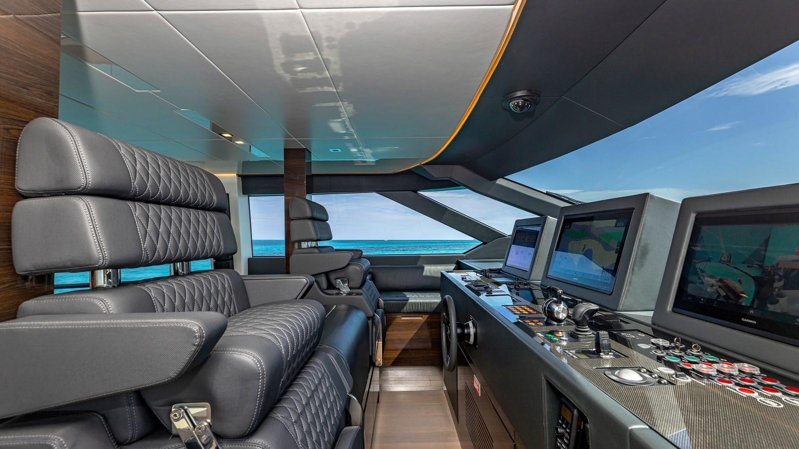 a room with a couch and a computer aboard INCENTIVIZED Yacht for Sale