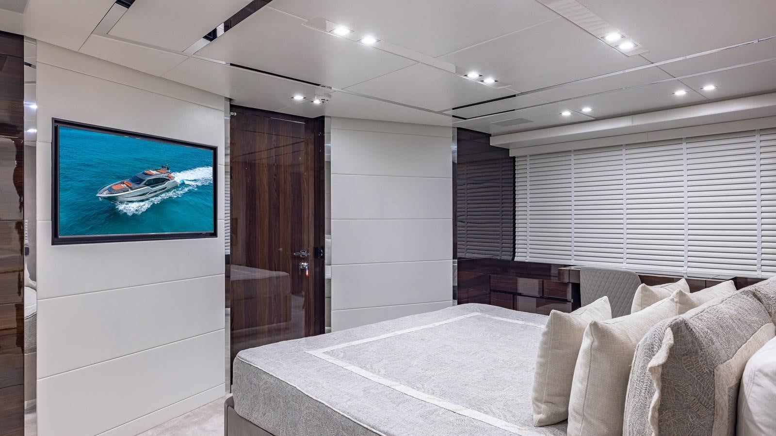 a large hotel room with a large tv on the wall aboard INCENTIVIZED Yacht for Sale