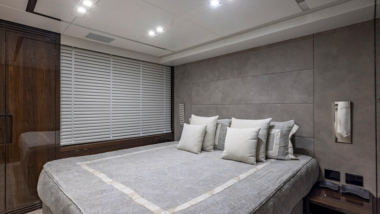 a large bed in a room aboard INCENTIVIZED Yacht for Sale