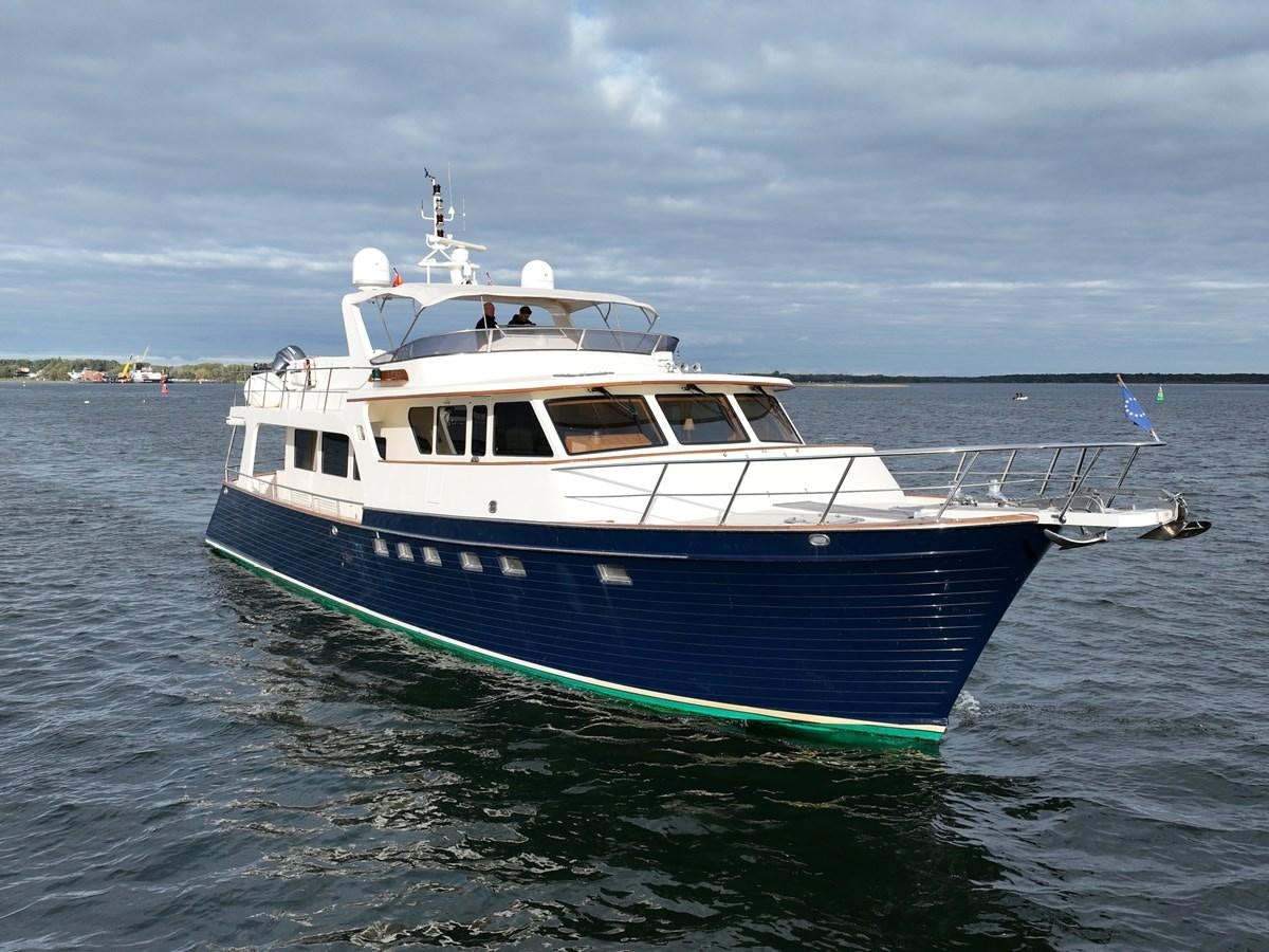 a large boat in the water aboard AZURA Yacht for Sale