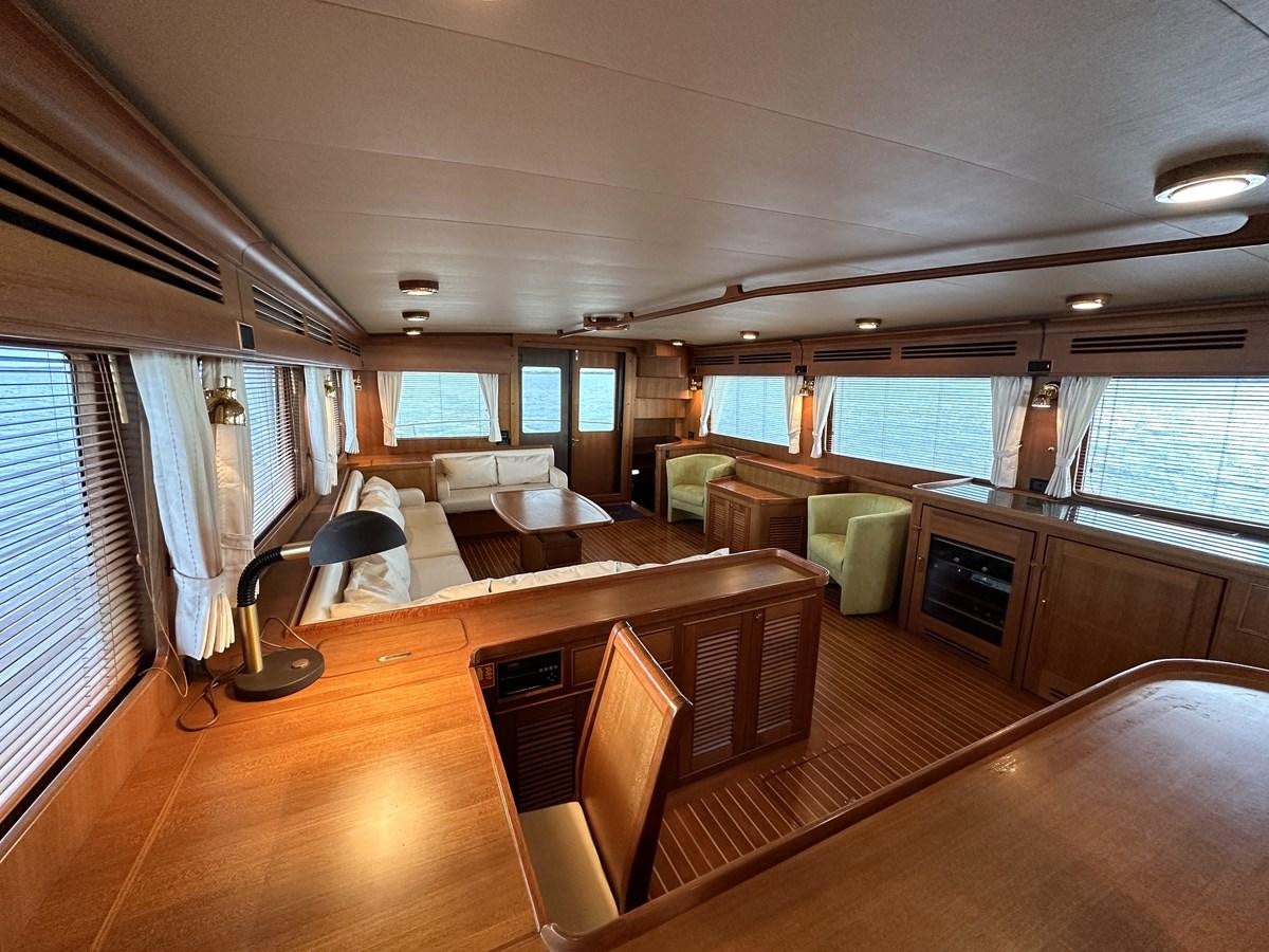 a large room with a wood floor and a wood floor aboard AZURA Yacht for Sale