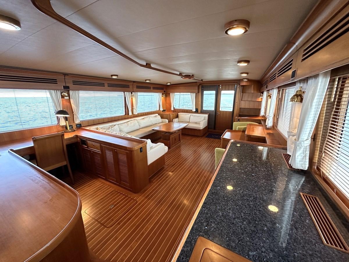a large room with a large window aboard AZURA Yacht for Sale