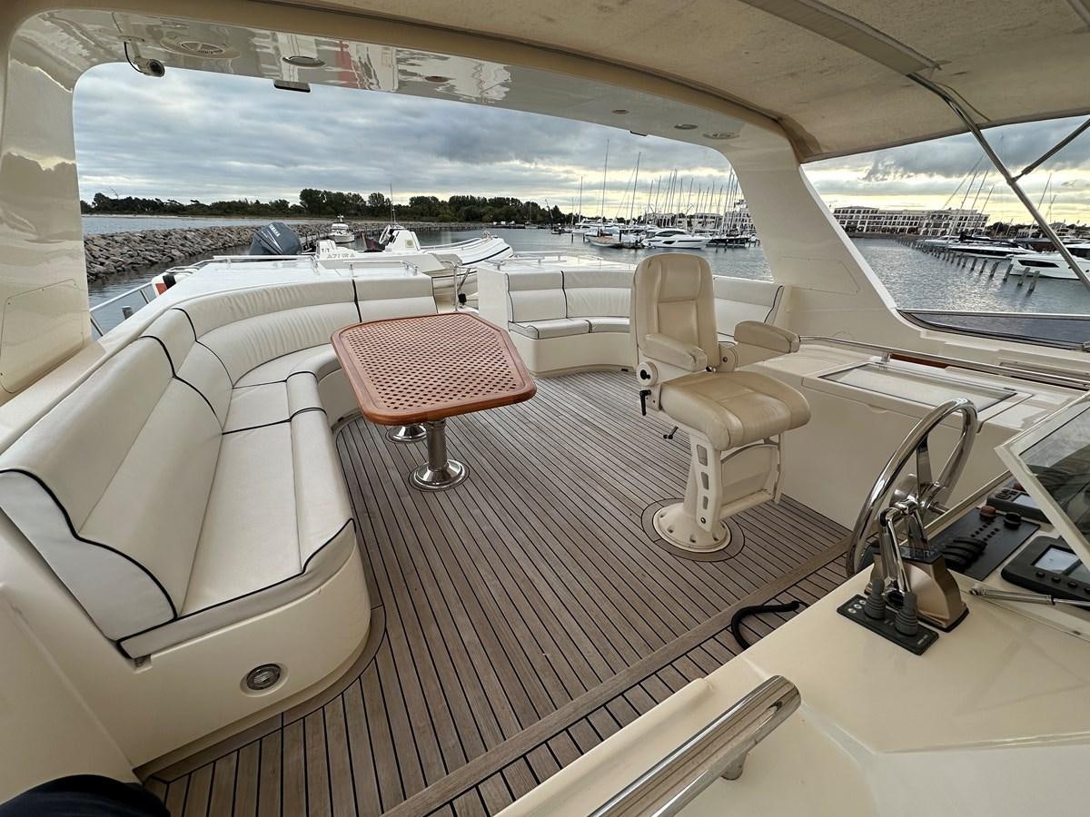 a room with a view of a city and a large city aboard AZURA Yacht for Sale