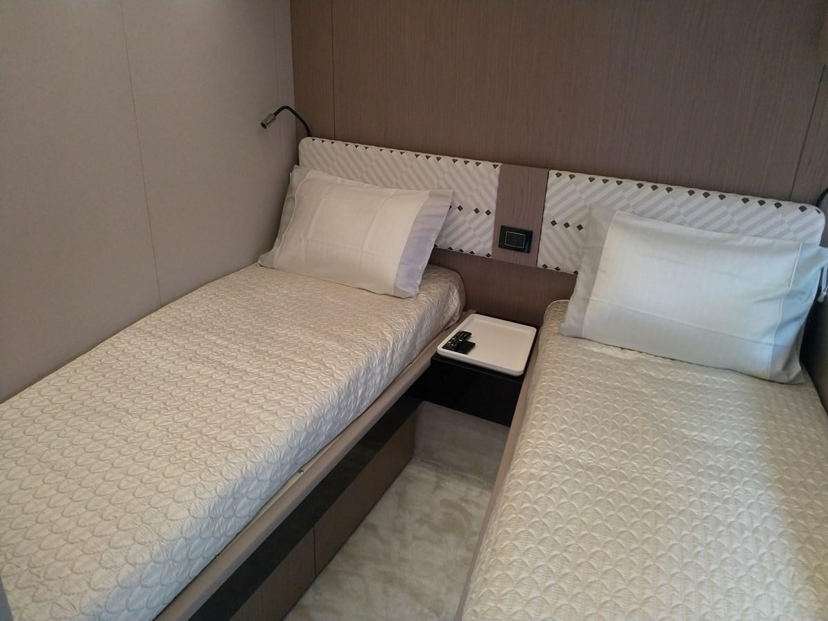 a couple of beds in a hotel room aboard BLUE Yacht for Sale